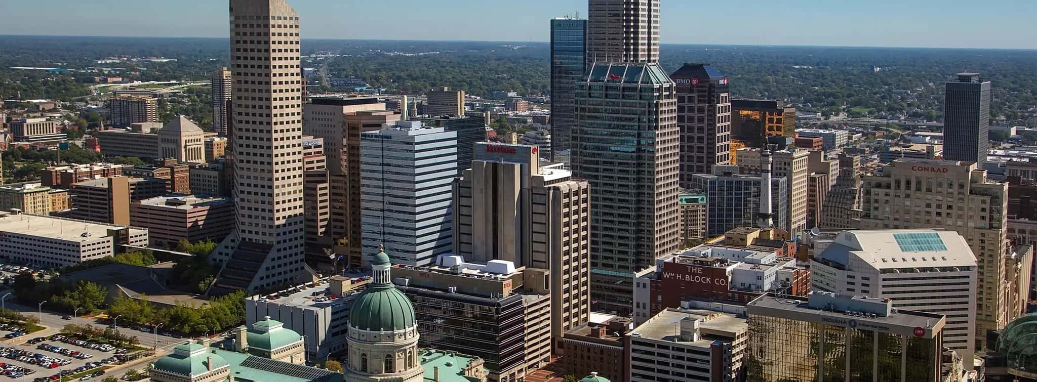 Aerial view of downtown Indianapolis, Indiana, with the Indiana Statehouse dome in the foreground