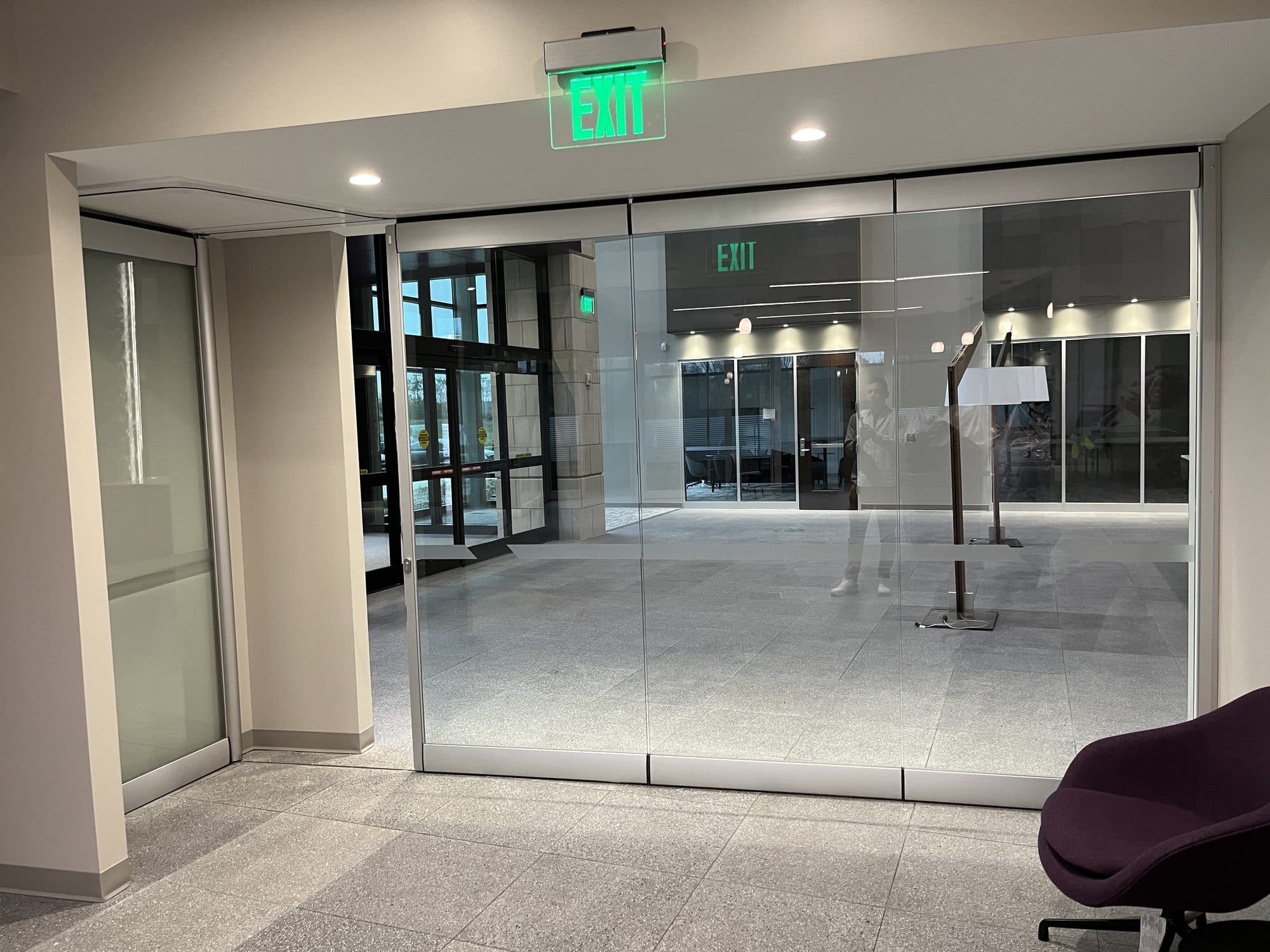 Modernfold ComfortDrive on PureView glass wall closed across the room, Advia Credit Union, Kalamazoo