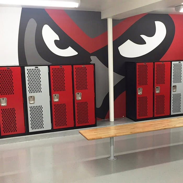 Athletic Team varsity lockers in red installed in a school locker room