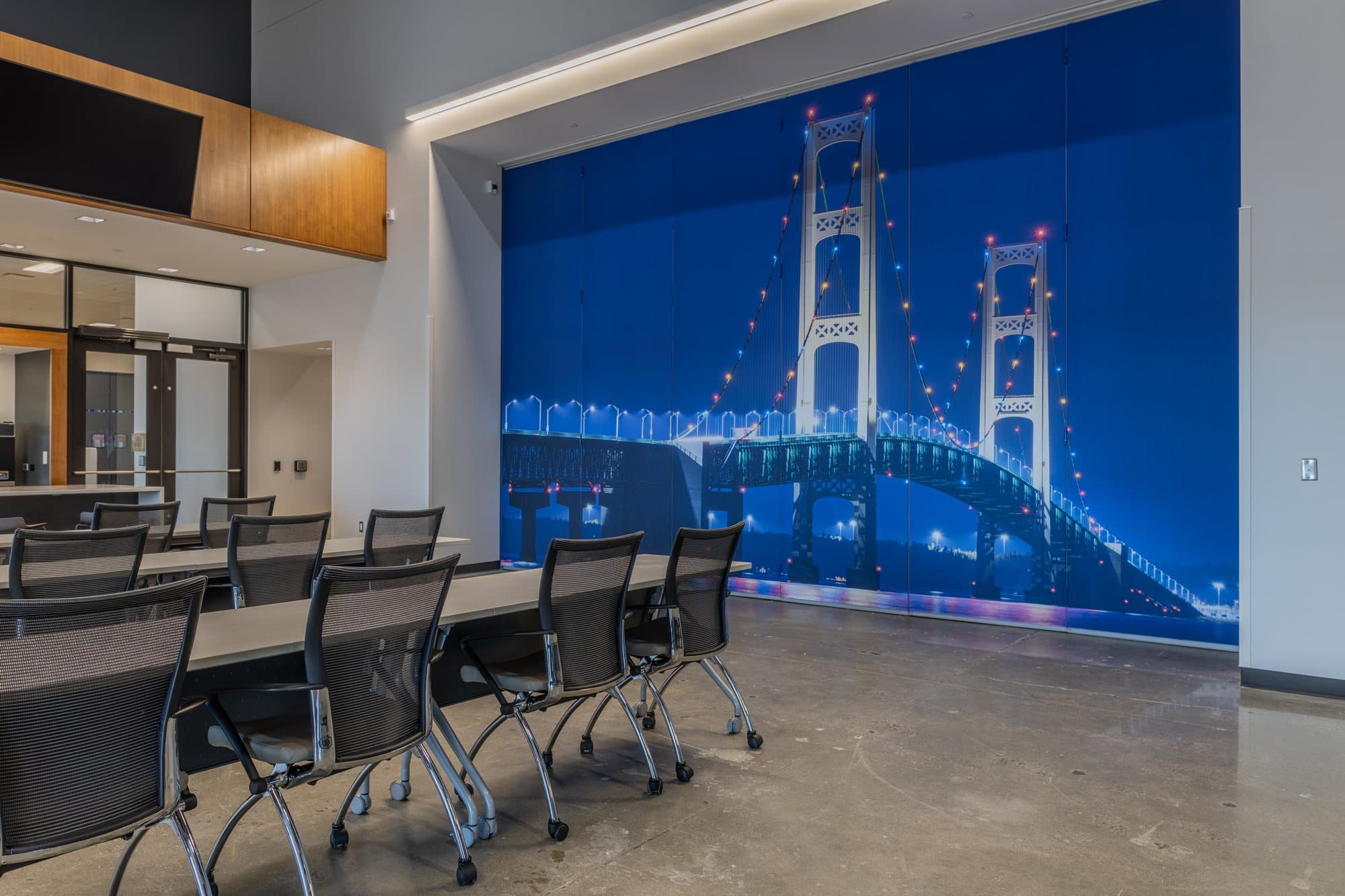 Modernfold operable wall with custom-printed Mackinac Bridge mural at Feeding America West Michigan, Kentwood