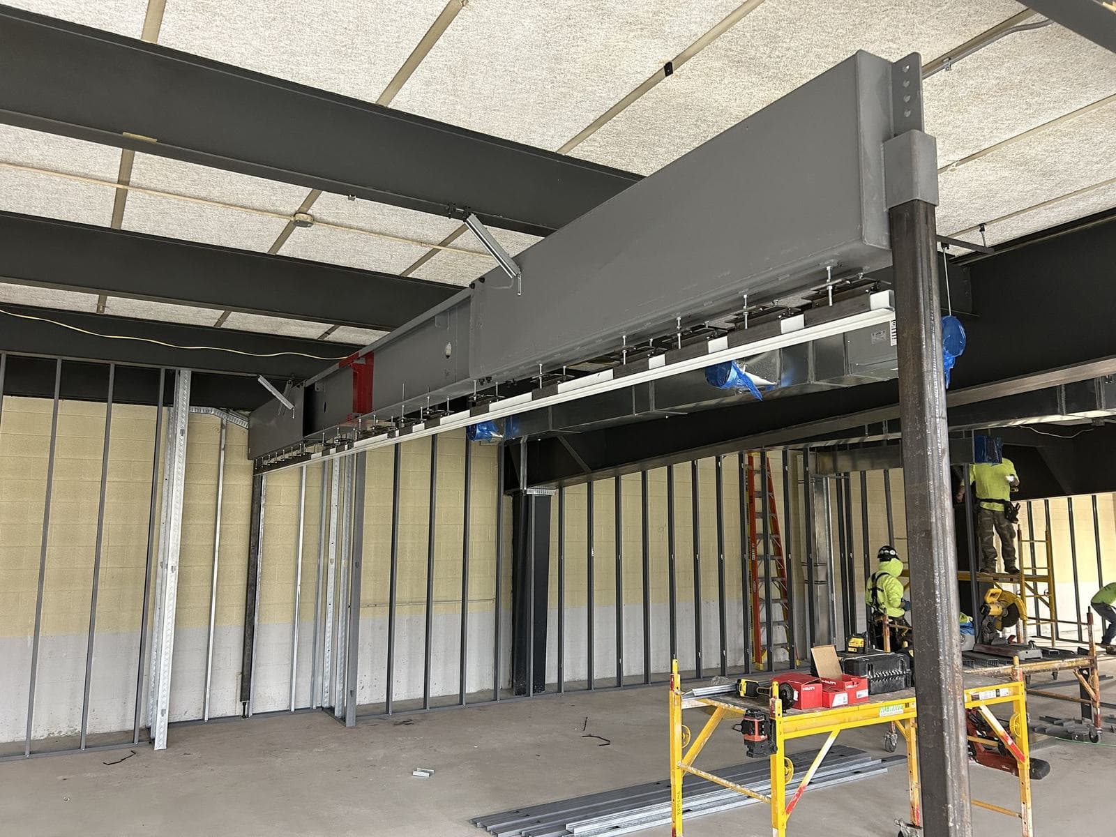 Modernfold Truss System steel beam on a post with operable wall track hung beneath it