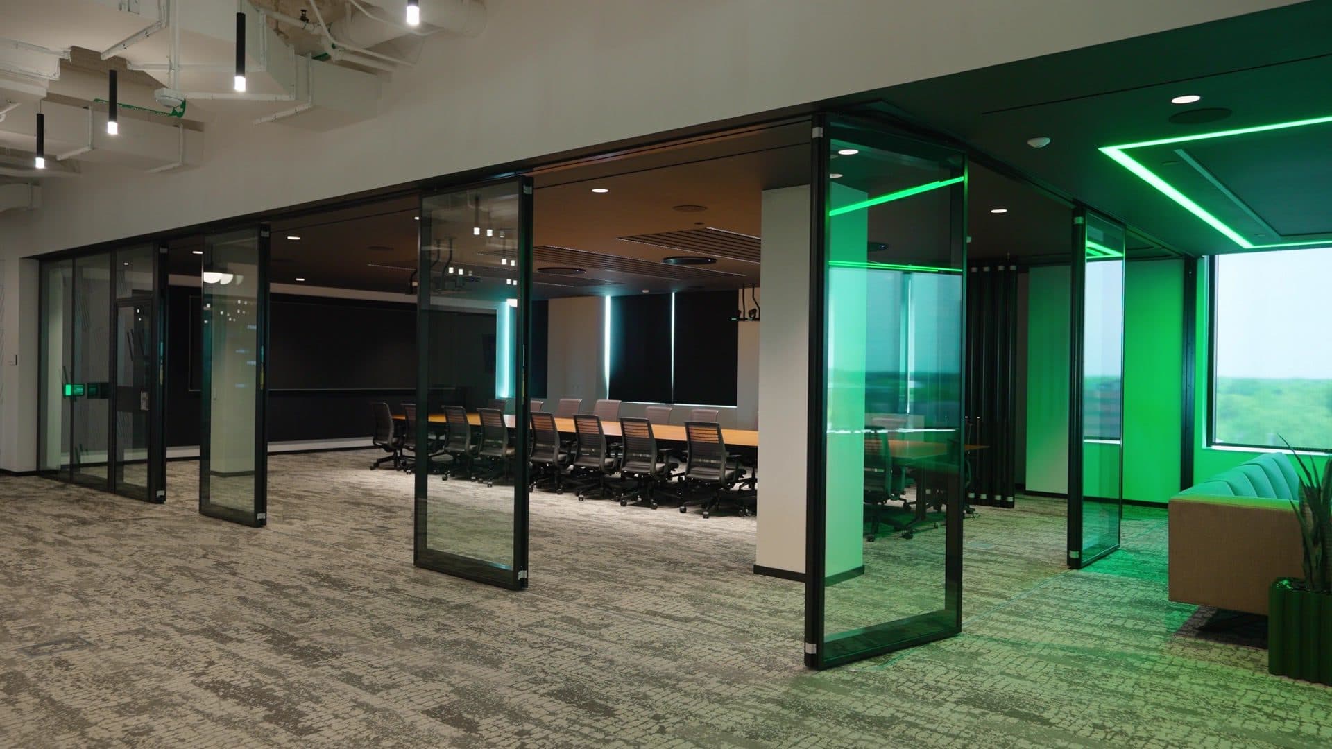 ComfortDrive Acousti-Clear glass panels traveling out of the stack at the 311 Abbot building