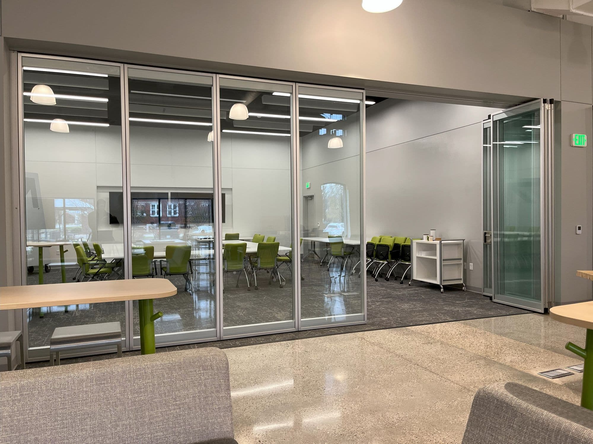 Acousti-Clear glass wall at the GMB Learning Hub with the last panels at the stack