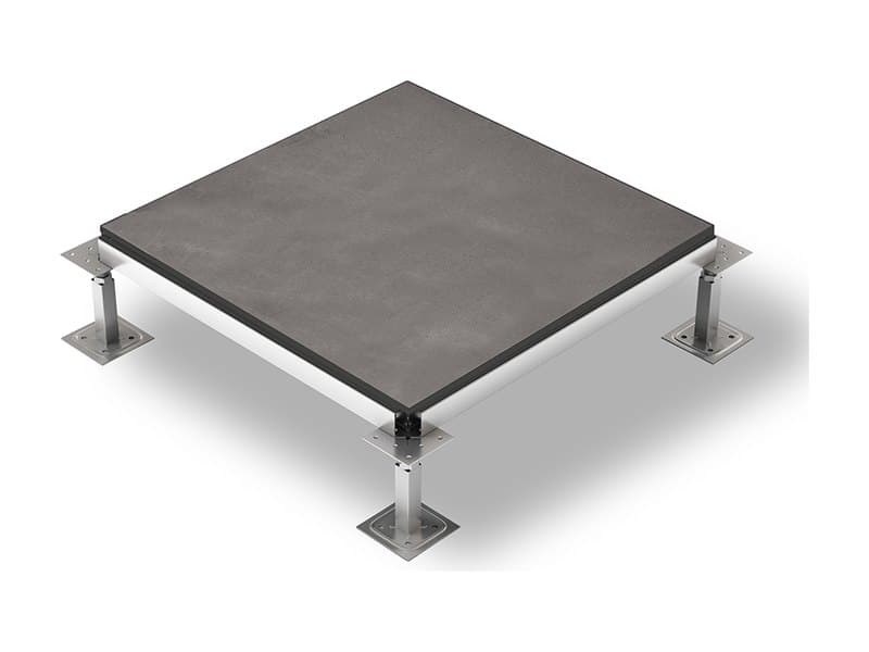 Dark grey laminated porcelain tile on a raised access floor panel on pedestals